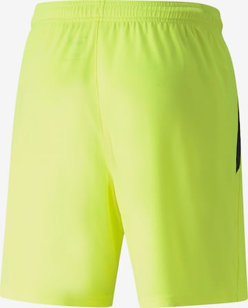 PUMA Regular Workout Pants in Yellow