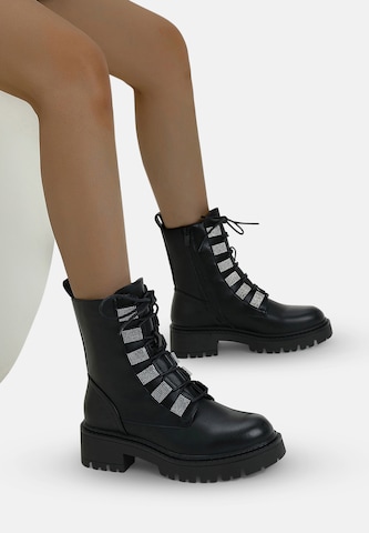 Elara Snørestøvletter i sort