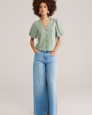 Bluză de la WE Fashion pe verde