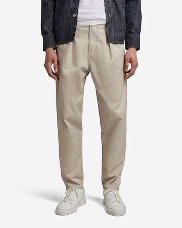 Loosefit Pantalon chino G-Star RAW en beige : devant