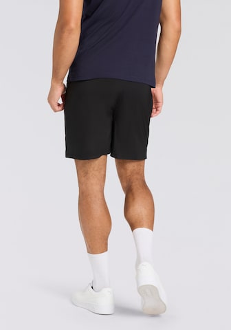 PUMA Slimfit Sportshorts 'Train All Day Foundations' in Schwarz