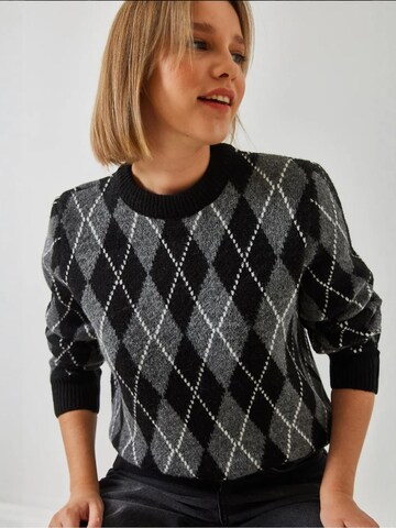 Bianco Lucci Trui in Zwart: voorkant