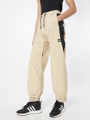 Effilé Pantalon de sport QUIKSILVER en beige : devant