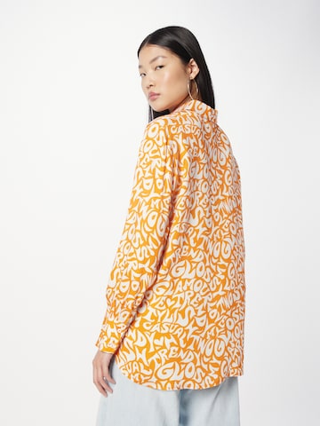 Emily Van Den Bergh - Blusa en naranja