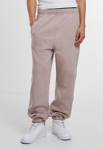 Tapered Pantaloni di Urban Classics in rosa: frontale
