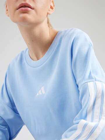ADIDAS SPORTSWEAR Sport sweatshirt i blå