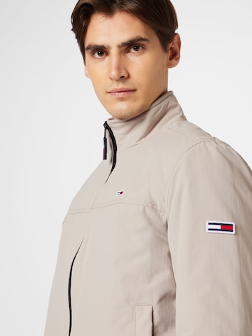 Tommy Jeans Between-Season Jacket 'Essential' in Beige