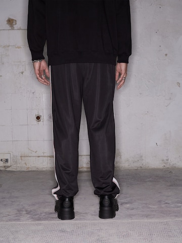 regular Pantaloni 'Enno' di ABOUT YOU x Rewinside in nero