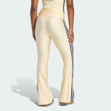 Bootcut Pantaloni sportivi 'Superstar' di ADIDAS PERFORMANCE in giallo