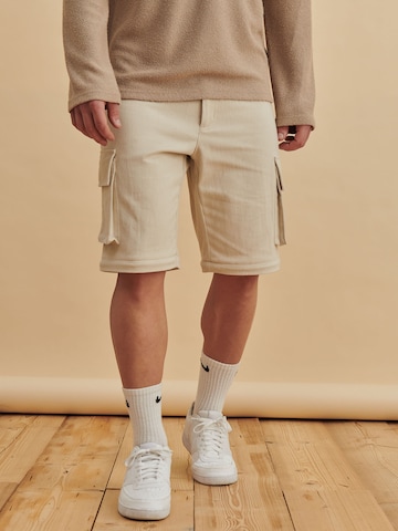 DAN FOX APPAREL Tapered Cargo trousers 'Hasan' in Beige