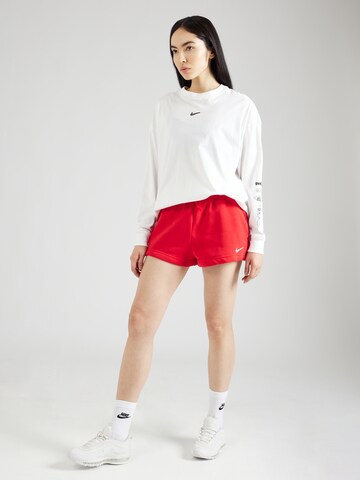 Nike Sportswear Loose fit Trousers 'Phoenix Fleece' in Red