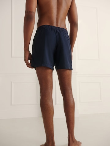 Guido Maria Kretschmer Men Board Shorts 'Gabriel' in Blue