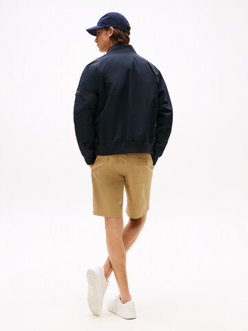 TOMMY HILFIGER Tussenjas in Blauw