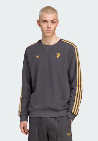 ADIDAS ORIGINALS Sweatshirt 'Manchester United Terrace Icons' in Schwarz: Vorderseite
