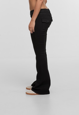 True Religion Flared Jeans in Schwarz