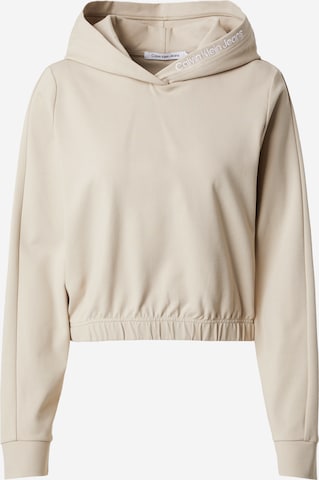 Sweat-shirt Calvin Klein Jeans en beige : devant