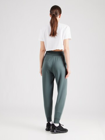 NIKE Tapered Sports trousers 'ONE' in Green