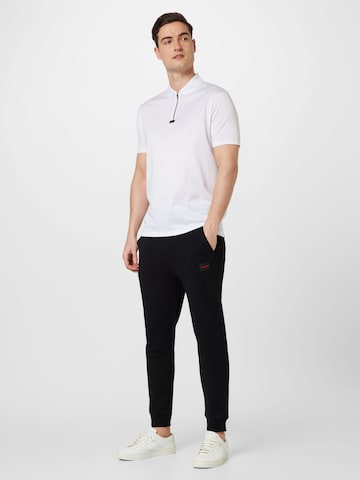 Effilé Pantalon 'Doak' HUGO Red en noir