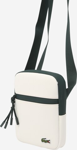 LACOSTE Skuldertaske i beige: forside