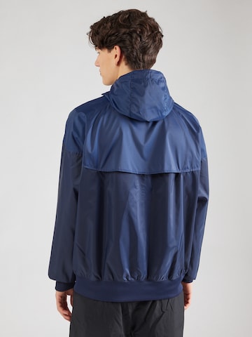 Nike SportswearPrijelazna jakna - plava boja