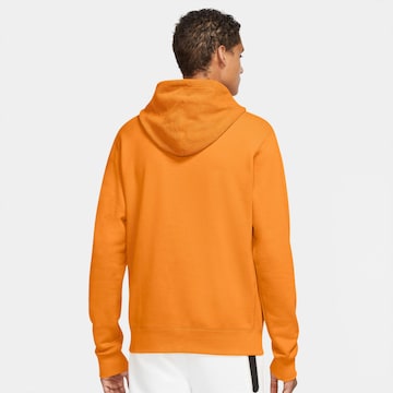 Nike Sportswear - Sudadera 'Swoosh League' en naranja