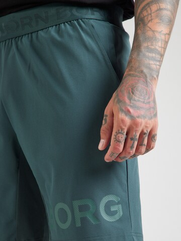 BJÖRN BORG - Regular Calças de desporto em verde