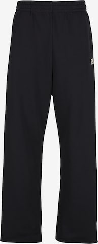 Karl Kani Loose fit Trousers '89' in Black: front