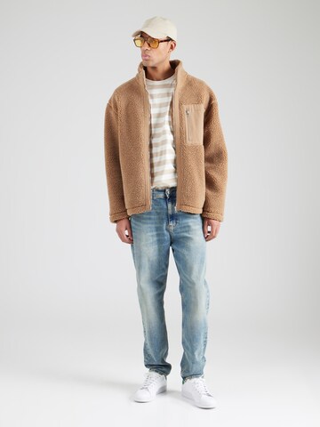 Tommy Jeans Tapered Τζιν 'Isaac' σε μπλε