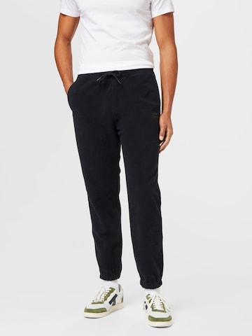 HOLLISTER Tapered Trousers in Black: front