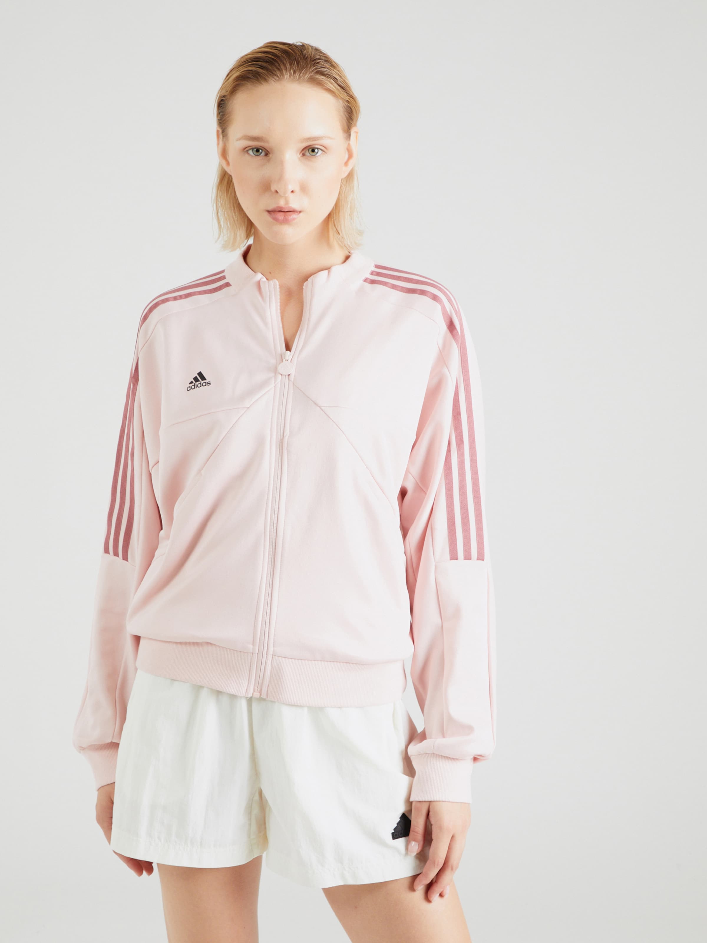 ADIDAS SPORTSWEAR Sports jacket TIRO in Pink Rose ABOUT YOU
