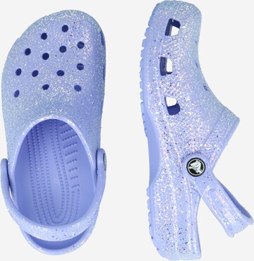 Chaussures ouvertes Crocs en bleu