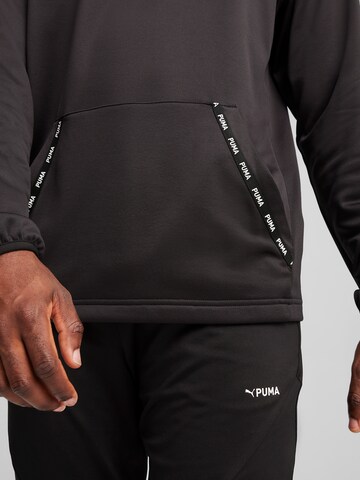 PUMA Sportsweatshirt in Zwart