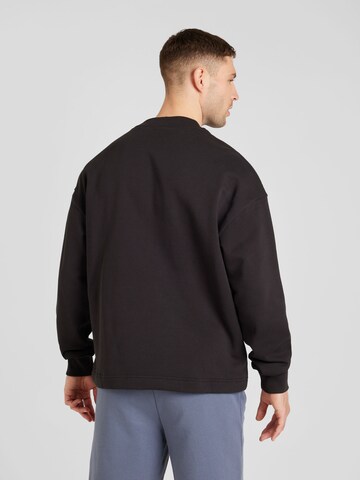 HUGO Sweatshirt 'Ninnyo' in Schwarz