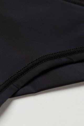 INTIMISSIMI Slip in Schwarz