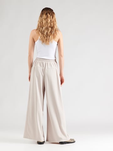 ABOUT YOU Широкий Брюки со складками 'Anian' в Бежевый