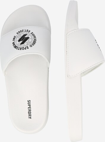 Claquettes / Tongs Superdry en blanc