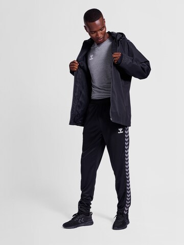 Veste de sport Hummel en noir