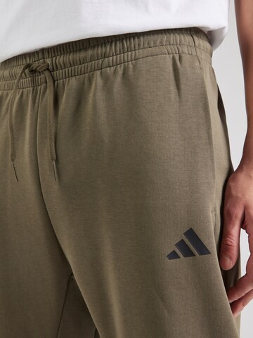 ADIDAS SPORTSWEAR Tapered Sports trousers in Green