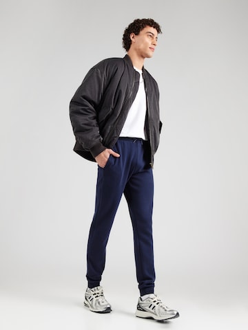 ELLESSE Zúžený strih Nohavice 'Cravo 2' - Modrá