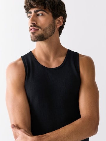 Next Tielko - Čierna