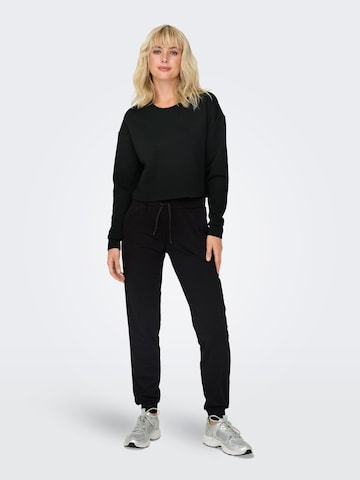 ONLY PLAY Tapered Sportbyxa i svart