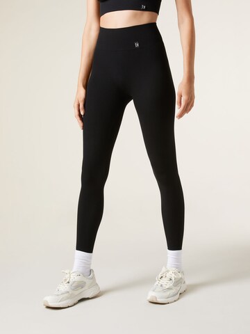 CALZEDONIA Skinny Athletic Pants in Black