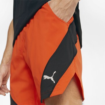 PUMA Regular Sportbroek in Oranje