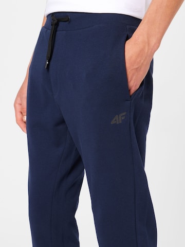 Effilé Pantalon de sport 4F en bleu