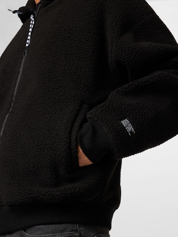 Giacca di pile 'Sherpa Full Zip Hoodie' di LEVI'S ® in nero