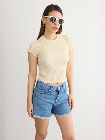 T-shirt Hiccup en beige : devant