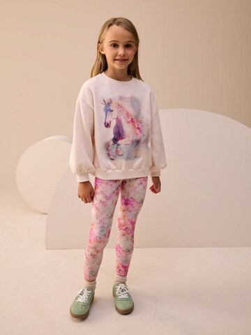 Next Set i beige: framsida