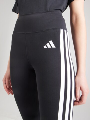 Flared Pantaloni sportivi di ADIDAS PERFORMANCE in nero