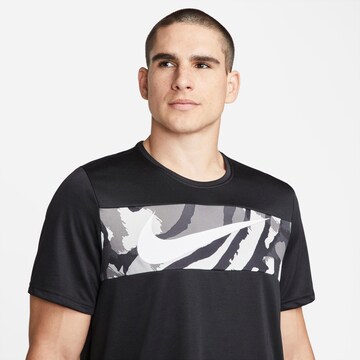 NIKE - Camiseta funcional 'Sport Clash' en negro
