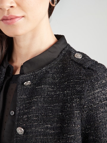 ABOUT YOU - Chaqueta de entretiempo 'Caya' en negro